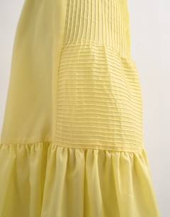 Model wearing Tiered crinkle maxi skirt in yellow