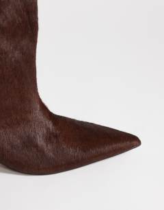 Model wearing Tina hair on real leather kitten heel knee boot in chestnut