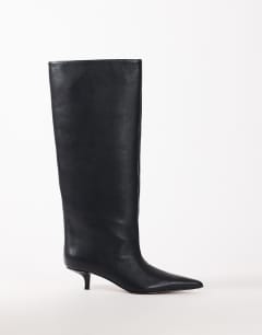 Model wearing Tina real leather kitten heel knee boot in black