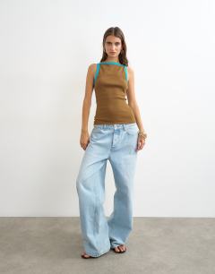 Model wearing Tipping slash neck racer vest in chocolate