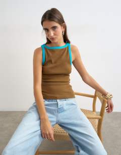 Model wearing Tipping slash neck racer vest in chocolate