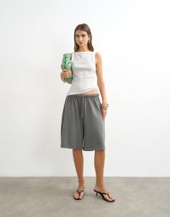 Model wearing Tipping slash neck racer vest in grey