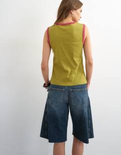 Model wearing Tipping slim tank in green