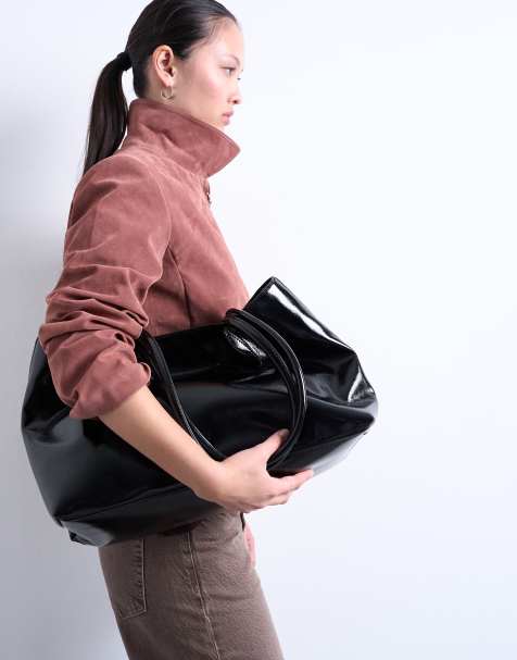 Topshop Toby tubular handle tote bag in black - view 1