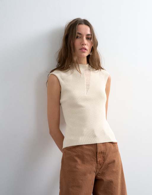 Topshop - Top a maniche lunghe in maglia trasparente color avorio