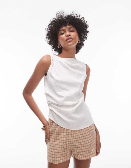 Topshop – Top bez rękawów z ozdobnym węzłem z boku w kolorze kości słoniowej