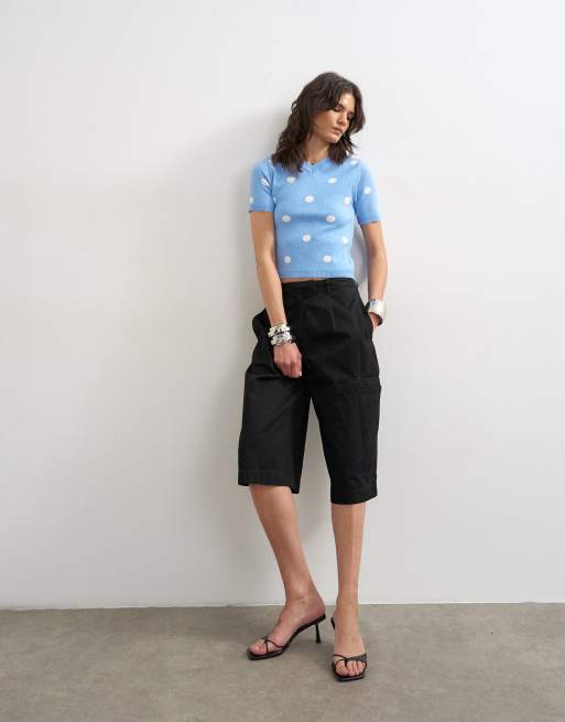 Topshop - Top in maglia blu a pois con scollo a V alto, 2 di 4