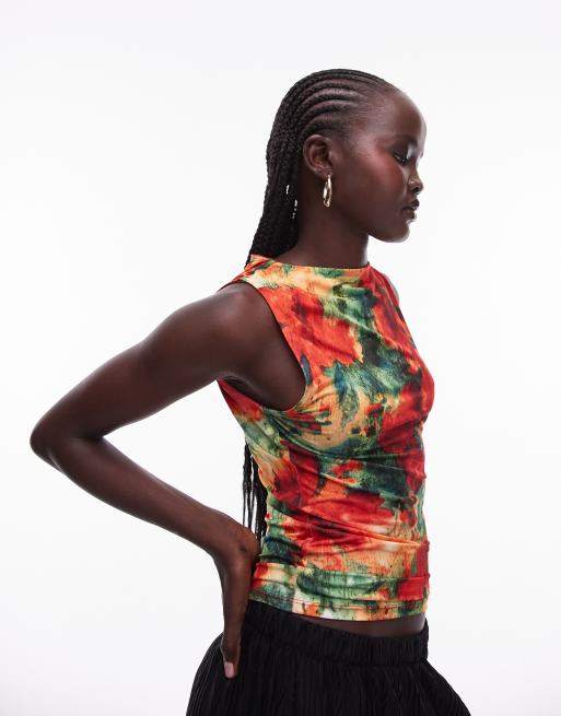 Topshop - Top senza maniche rosso con stampa a fiori sfocata