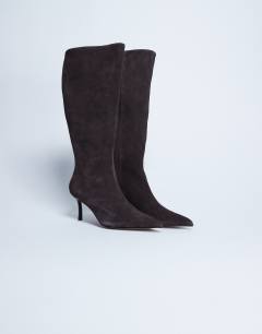 Model wearing Tori real suede knee high point toe boot in chocolate