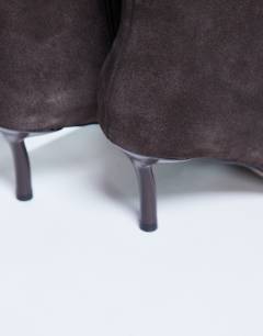 Model wearing Tori real suede knee high point toe boot in chocolate