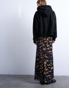 Model wearing Tortoise shell animal print mesh maxi skirt in black