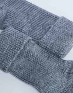 Model wearing Tot ribbed cosy sock in grey
