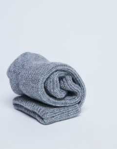 Model wearing Tot ribbed cosy sock in grey
