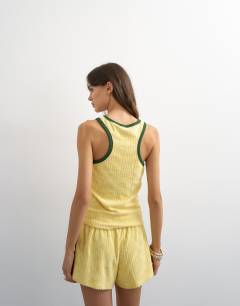 Model wearing Towelling scoop vest In yellow