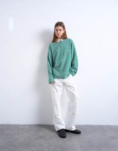 Model wearing Towelling stripe long sleeve polo in green