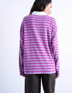 Model wearing Towelling stripe oversized long sleeve polo in pink
