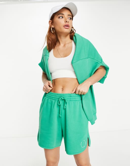 Topshop trackie shorts with logo branding in green (part of a set)