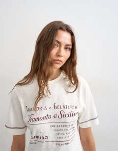 Model wearing Topshop 'Tramonto Di Sicilia' graphic tee in ecru
