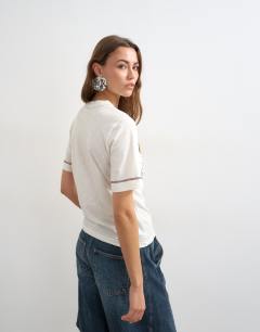 Model wearing Topshop 'Tramonto Di Sicilia' graphic tee in ecru