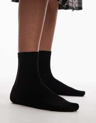 Topshop - Transparente, gerippte Socken in Schwarz