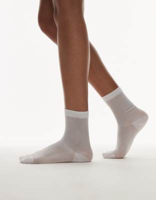 Topshop - Transparente, gerippte Socken in Weiß-Gelb