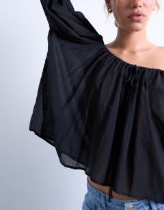 Model wearing Trapeze long sleeve tie detail blouse in  black