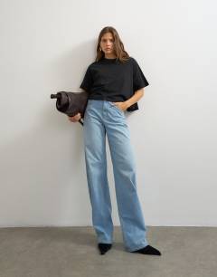 Model wearing Trapeze tee in black
