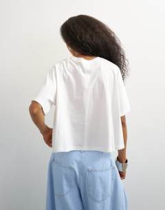 Model wearing Trapeze tee in ecru