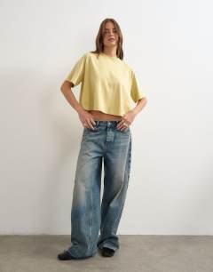 Model wearing Trapeze tee in yellow