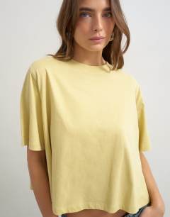 Model wearing Trapeze tee in yellow