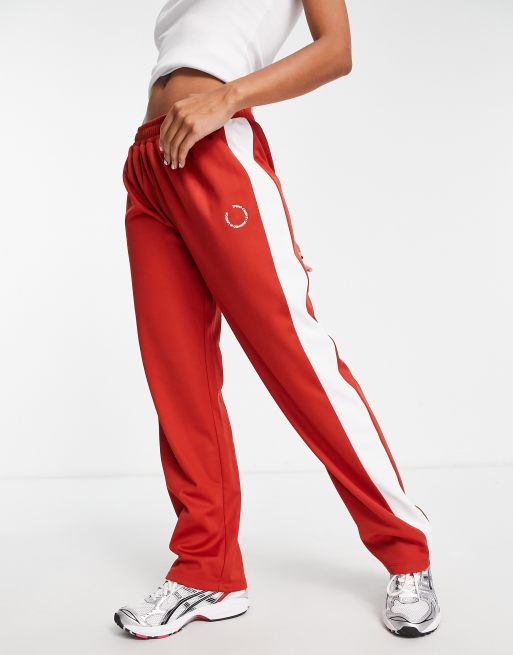 Womens red joggers with white sales stripe