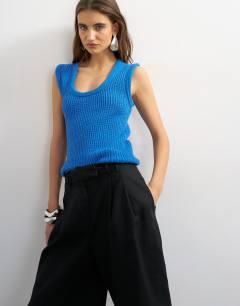 Model wearing Tubular trim vest in blue