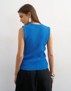 Model wearing Tubular trim vest in blue