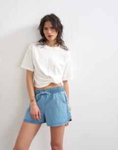 Model wearing Tuck hem boxy tee in ivory