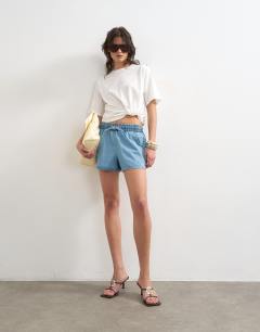 Model wearing Tuck hem boxy tee in ivory