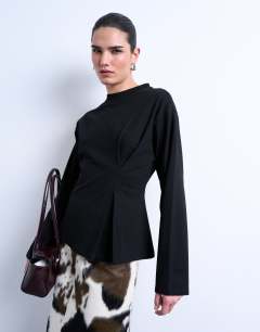 Model wearing Tuck waist long sleeve tee in black