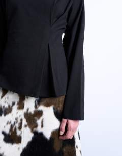 Model wearing Tuck waist long sleeve tee in black