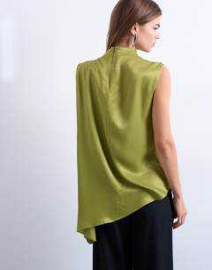 Model wearing Tunic tuck sleeveless top in green