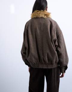 Model wearing Twill bomber with faux fur collar with wool in brown