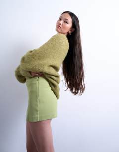 Model wearing Twill clean skort in avocado green