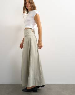 Model wearing Twill pleated midi skirt with belt detail in grey