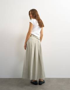 Model wearing Twill pleated midi skirt with belt detail in grey