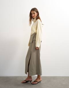 Model wearing Twill wrap tie detail maxi skirt in charcoal grey