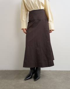 Model wearing Twill wrap waistband detail trench skirt in chocolate