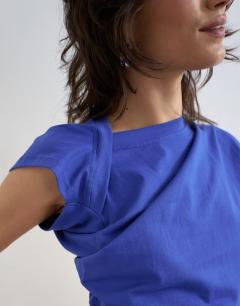 Model wearing Twist body tank in cobalt blue