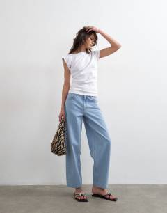 Model wearing Twist body tank in white