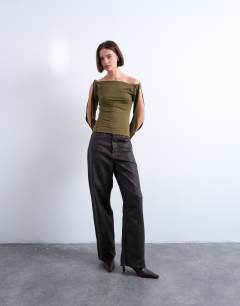 Model wearing Twist shoulder detail long sleeve top in brown