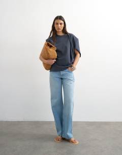 Model wearing Twist shoulder top in slate