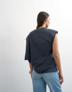 Model wearing Twist shoulder top in slate