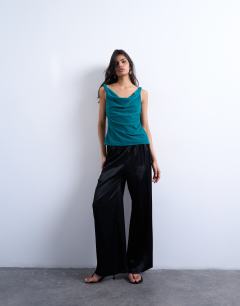 Model wearing Twist shoulder velvet cami in teal